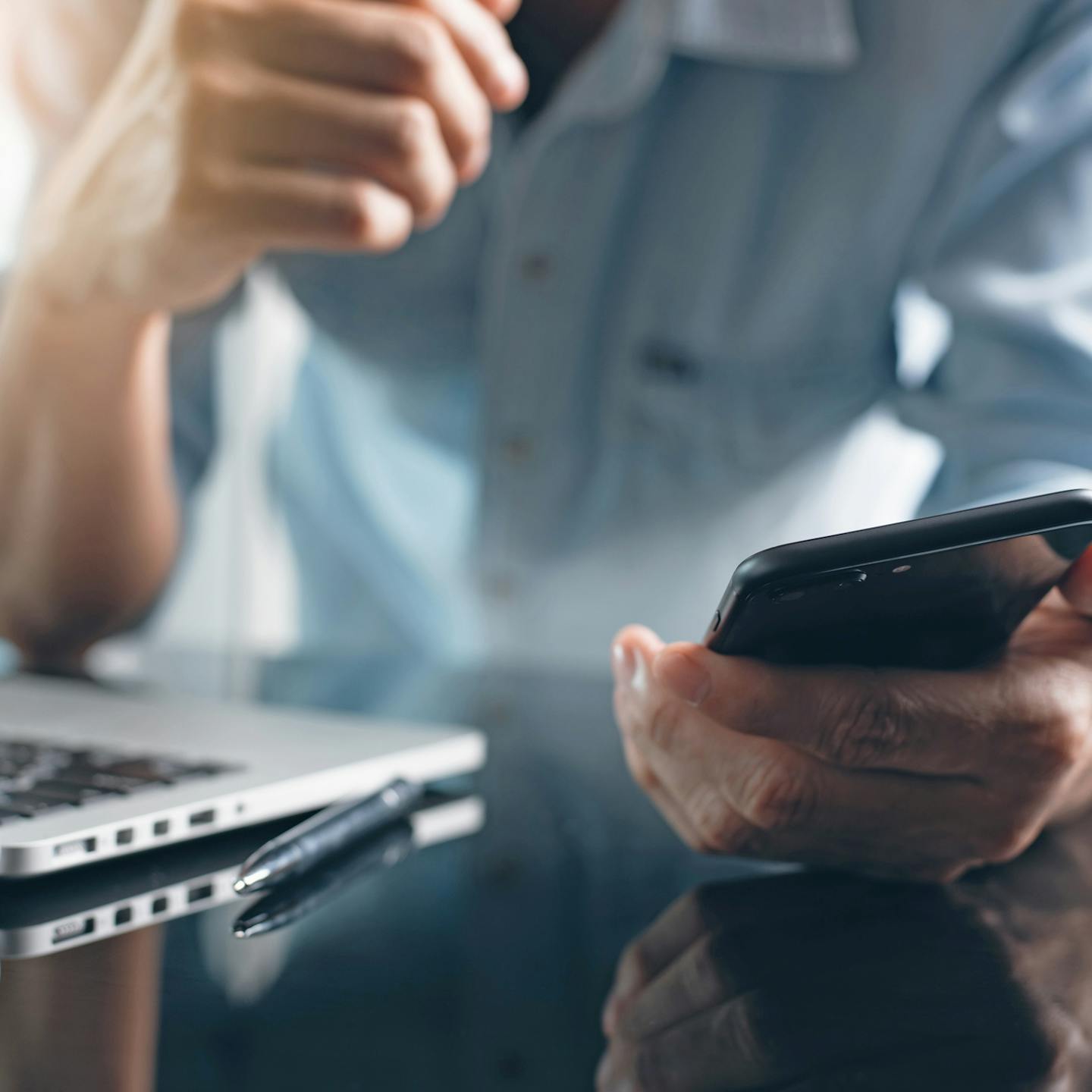 Man registering to a newsletter via a mobile phone