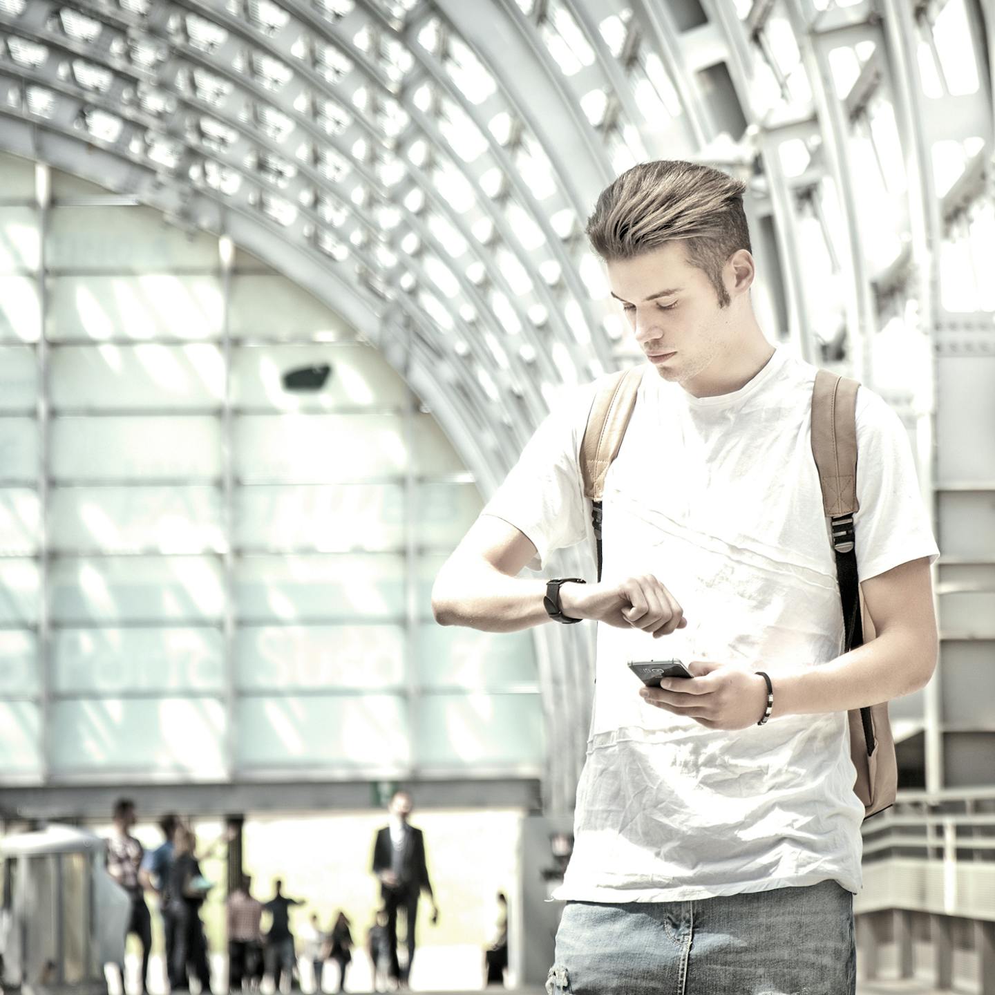 Man looking at his watch. Agility and on time